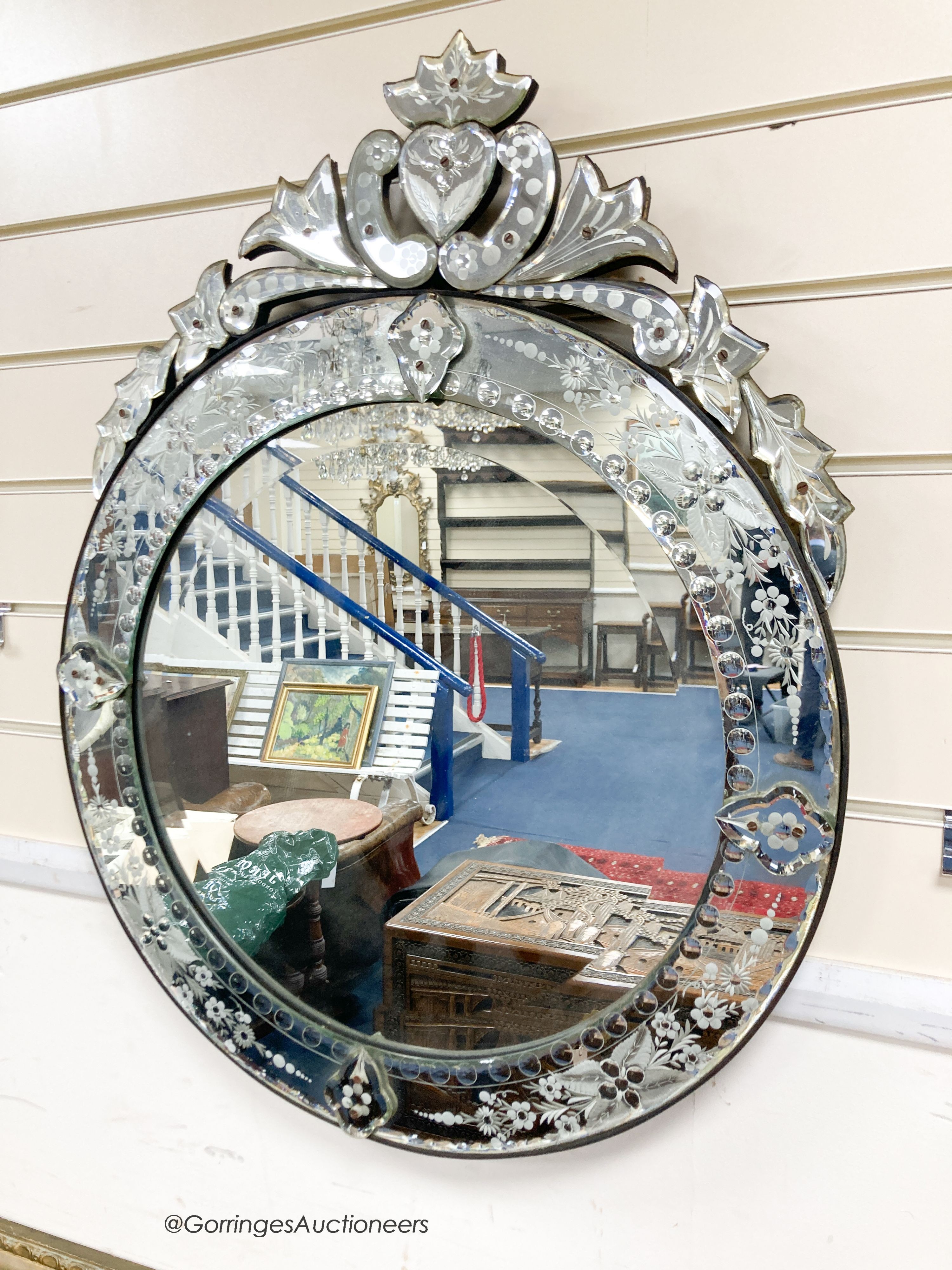 A pair of circular Venetian etched glass mirrors, diameter 58cm